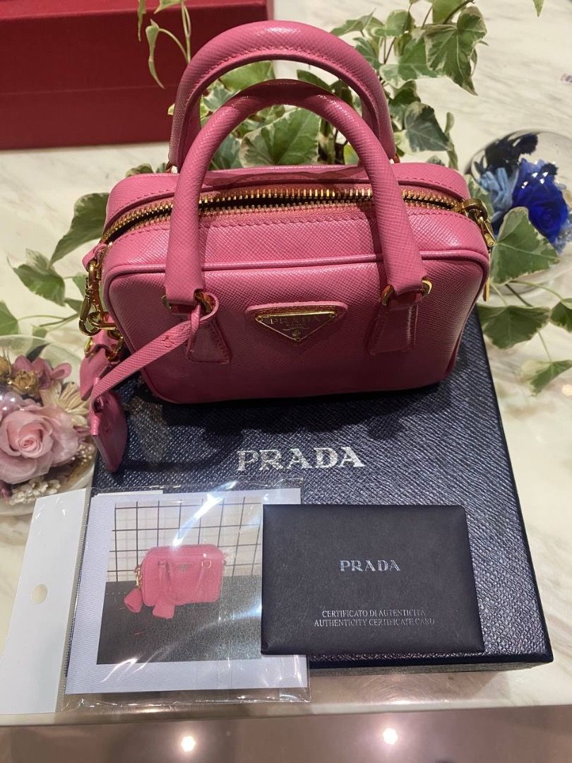 PRADA MINI SAFFIANO HANDLE BAG (Category: Luxury Bags & Wallets) located in Quezon City. Submitted by lavishly.ph (Listing ID 1299425506, Image 2). Description: PRADA MINI SAFFIANO HANDLE BAG with Entrupy, bought it in Taiwan. Inclusions are Box, Entrupy (Certificate of Authenticity), Authenticity Card. Selling it for 42,000 (still negotiable) NOTE: Lavishly.ph strongly advise buyers to conduct thorough research before completing a transaction, t