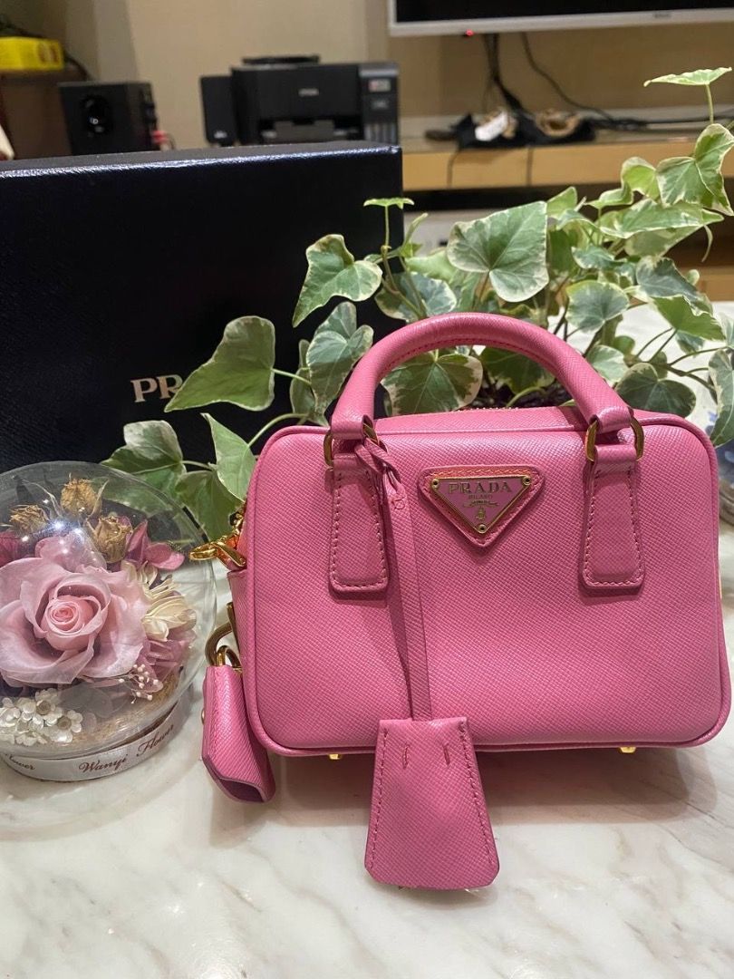 PRADA MINI SAFFIANO HANDLE BAG (Category: Luxury Bags & Wallets) located in Quezon City. Submitted by lavishly.ph (Listing ID 1299425506, Image 1). Description: PRADA MINI SAFFIANO HANDLE BAG with Entrupy, bought it in Taiwan. Inclusions are Box, Entrupy (Certificate of Authenticity), Authenticity Card. Selling it for 42,000 (still negotiable) NOTE: Lavishly.ph strongly advise buyers to conduct thorough research before completing a transaction, t