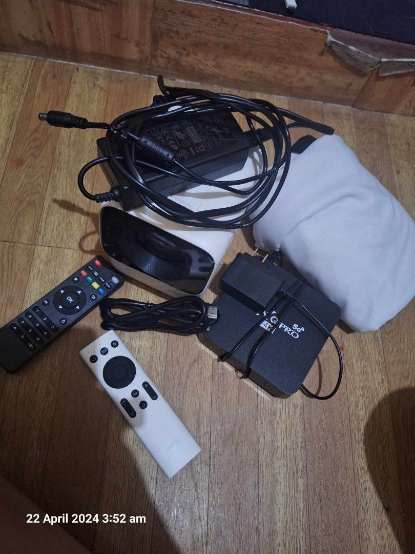Projector set (Category: Projectors) located in Quezon City. Submitted by inuyasha_07 (Listing ID 1299449703, Image 1). Description: wanbo T2 projector lang. white cloth screen no built in app.