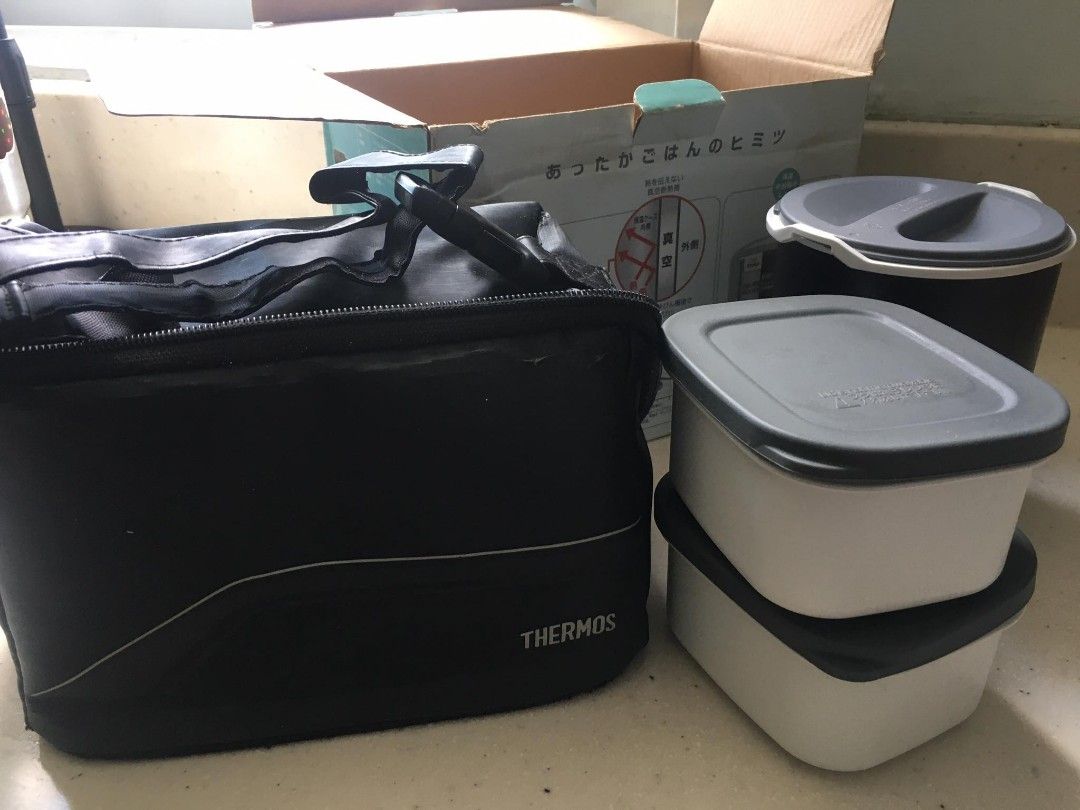 Thermos Japan Lunch Set with Box (Category: Food Organization & Storage) located in Manila. Submitted by gamitnimoi (Listing ID 1297918275, Image 2). Description: Thermos Japan lunchbox set with box. Issues: No chopsticks, but all else complete. Box with some water damage due to storage. Lunch bag flaking due to storage. Small dent in food jar. All else in good condition..