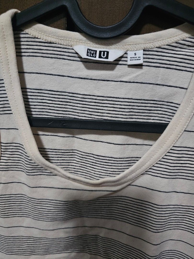 Uniqlo Sleeveless Sando (Category: Sleeveless) located in Mandaluyong City. Submitted by sayonalang (Listing ID 1299312449, Image 2). Description: Color: Cream Used only once.