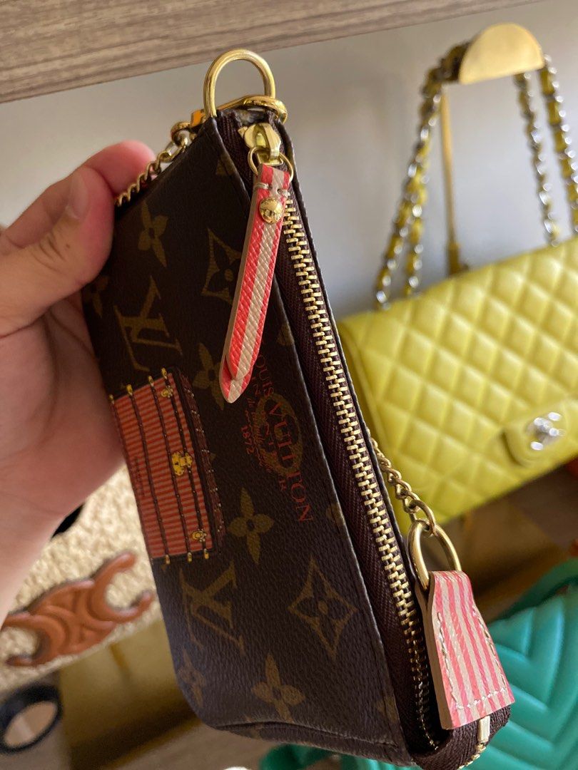 Authentic LV mini pochet (Category: Luxury Bags & Wallets) located in Binan City. Submitted by angels_luxury (Listing ID 1299602665, Image 3). Description: LV Mini Pochet Like New No Flaw hardware in very good condition Box, dustbag and paperbag Bnew Price: ₱56k Selling Price: ₱32k.