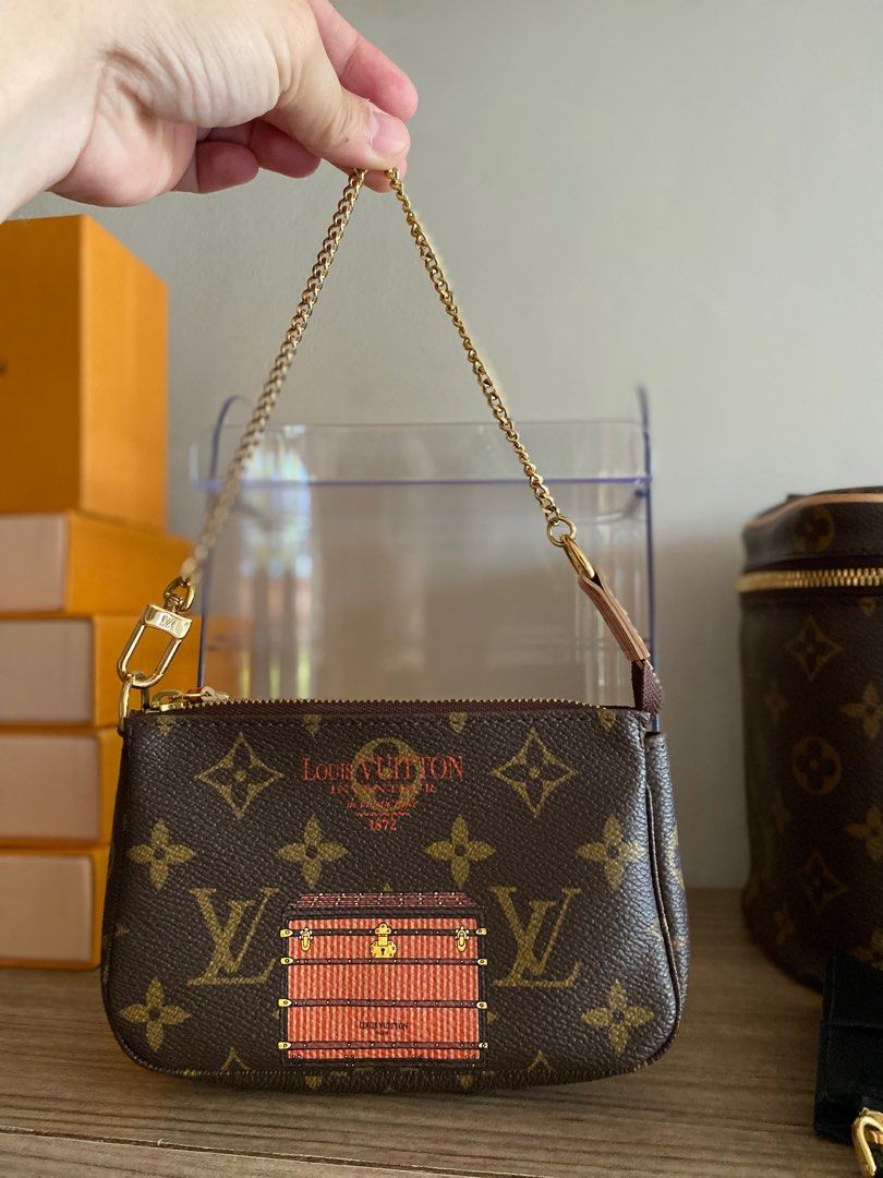 Authentic LV mini pochet (Category: Luxury Bags & Wallets) located in Binan City. Submitted by angels_luxury (Listing ID 1299602665, Image 2). Description: LV Mini Pochet Like New No Flaw hardware in very good condition Box, dustbag and paperbag Bnew Price: ₱56k Selling Price: ₱32k.