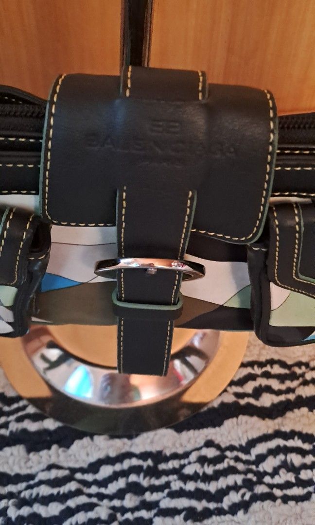 Balenciaga Shoulder Bag-Available (Category: Luxury Bags & Wallets) located in Baguio. Submitted by mng_assorted_baguio (Listing ID 1299525321, Image 2). Description: Balenciaga Shoulder Bag came from US personal box self authenticate still in very good used condition small size "kili" bag, with mulitple compartments and comes with extra pouch , will not fit long wallet canvass material with leather strap and trimmings NO COD/COP/shoppee CO.