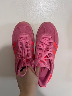 Lightly used indoor gazelle in pink / bright red stripes