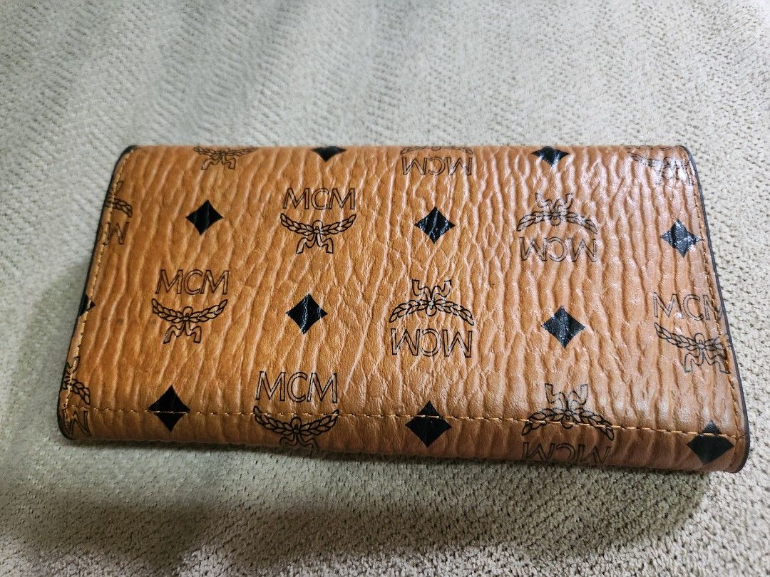 McM visetos long wallet in cognac (Category: Luxury Bags & Wallets) located in Taguig. Submitted by starbucksph (Listing ID 1299461715, Image 2). Description: McM visetos long wallet in cognac walang etiketa.