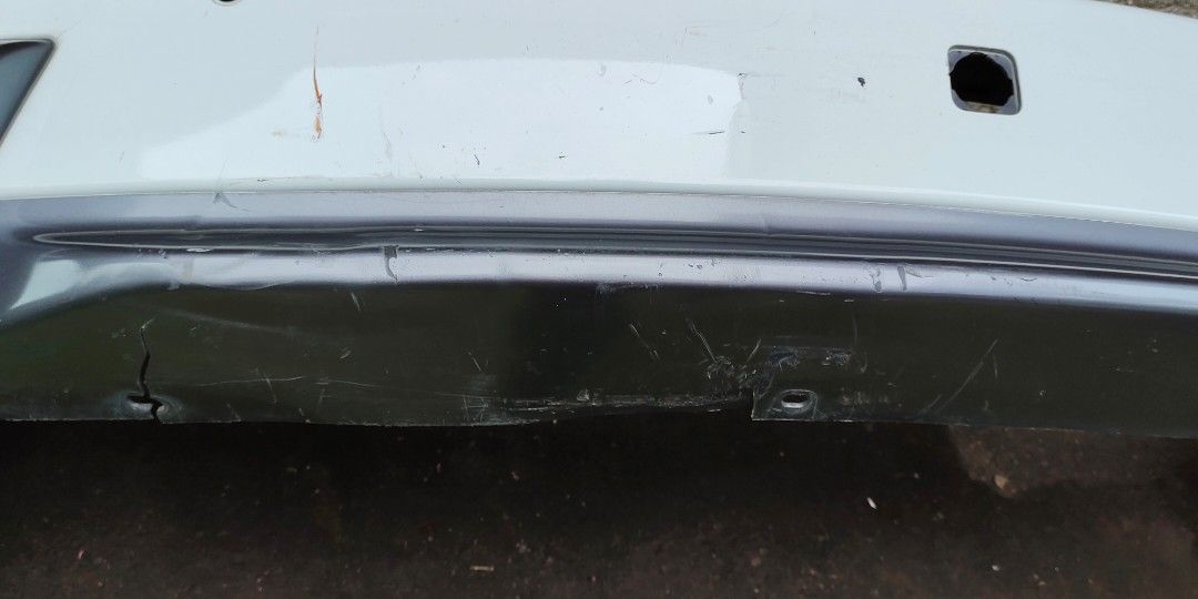 MUX 2015 Rear Bumper with damage (Category: Body Parts and Accessories) located in Cavite. Submitted by MLstore (Listing ID 1299560243, Image 1). Description: MUX 2015 Rear Bumper with damage may basag sa ilalim need repair pls see photos nalang negotiable sure buyer madali po kausap pickup only Trece Cavite.