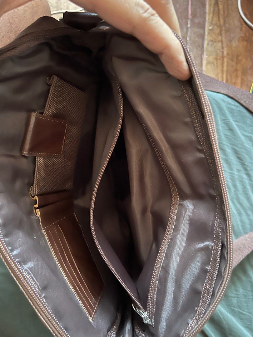 Pre loved Messenger bag Hickok essentials (Category: Sling Bags) located in Manila. Submitted by vagdula (Listing ID 1299471842, Image 2). Description: RFS: Declutterring 1pc Hickok Essentials Messenger bag 2 to 3 times used wala pang butas or damage all zippers are okay , been in the cabinet so long color: brown size: 38x32cm no warranty no return no exchange .