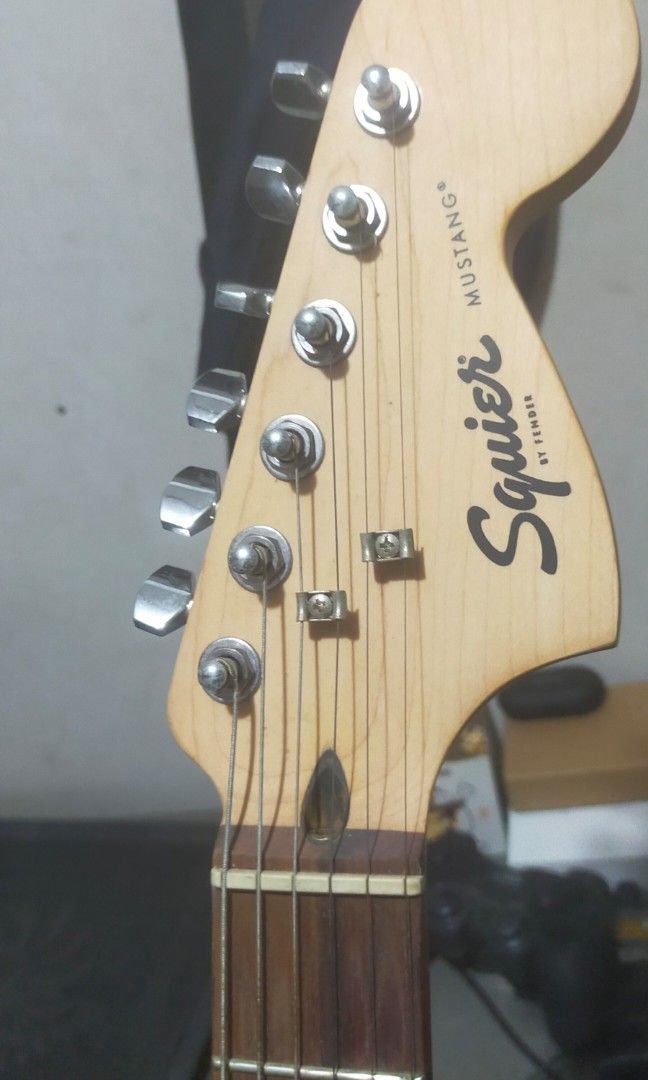 Squier Mustang by Fender (Category: Musical Instruments) located in Quezon City. Submitted by hobbyton74 (Listing ID 1299559121, Image 3). Description: Squier Mustang for sale Crafted in Indonesia purchased in 2019 at JB Music Store. used only once sa gig then usually practice lang sa house. stored in a gig bag most of the time. include ko na rin for free yung: 1 pc Kokko distortion pedal (no box and power cable) 2 pcs guitar cable 1 pc gig bag 1