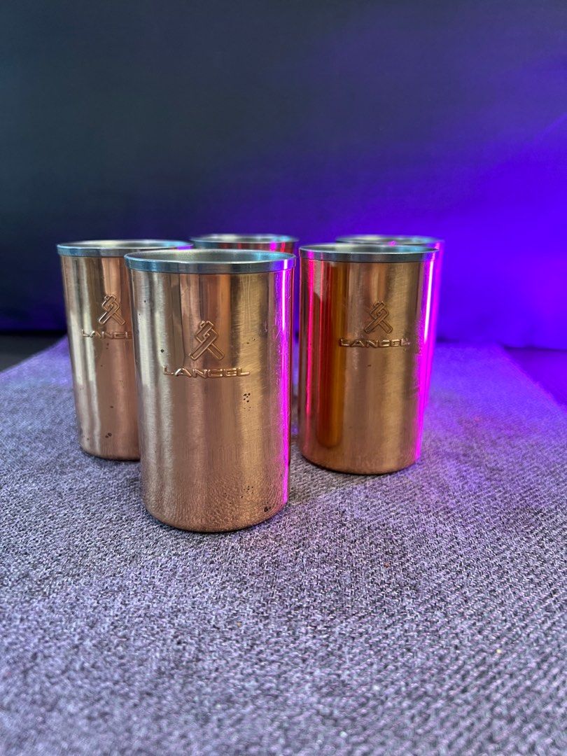 Vintages Lancel Copper drinking cup (Category: Coffee & Tea Tableware) located in Makati City. Submitted by affordableeleganceemporium (Listing ID 1299523929, Image 1). Description: Immerse yourself in the rich tradition of beverage enjoyment with the Vintage Lancel Copper Drinking Cup. Here’s why it’s a unique and distinguished addition to your collection: 1. **Heritage Craftsmanship:** Crafted with precision and care, this vintage Lancel copper