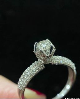 .60ct middle stone
.20ct side stone
18k white gold
