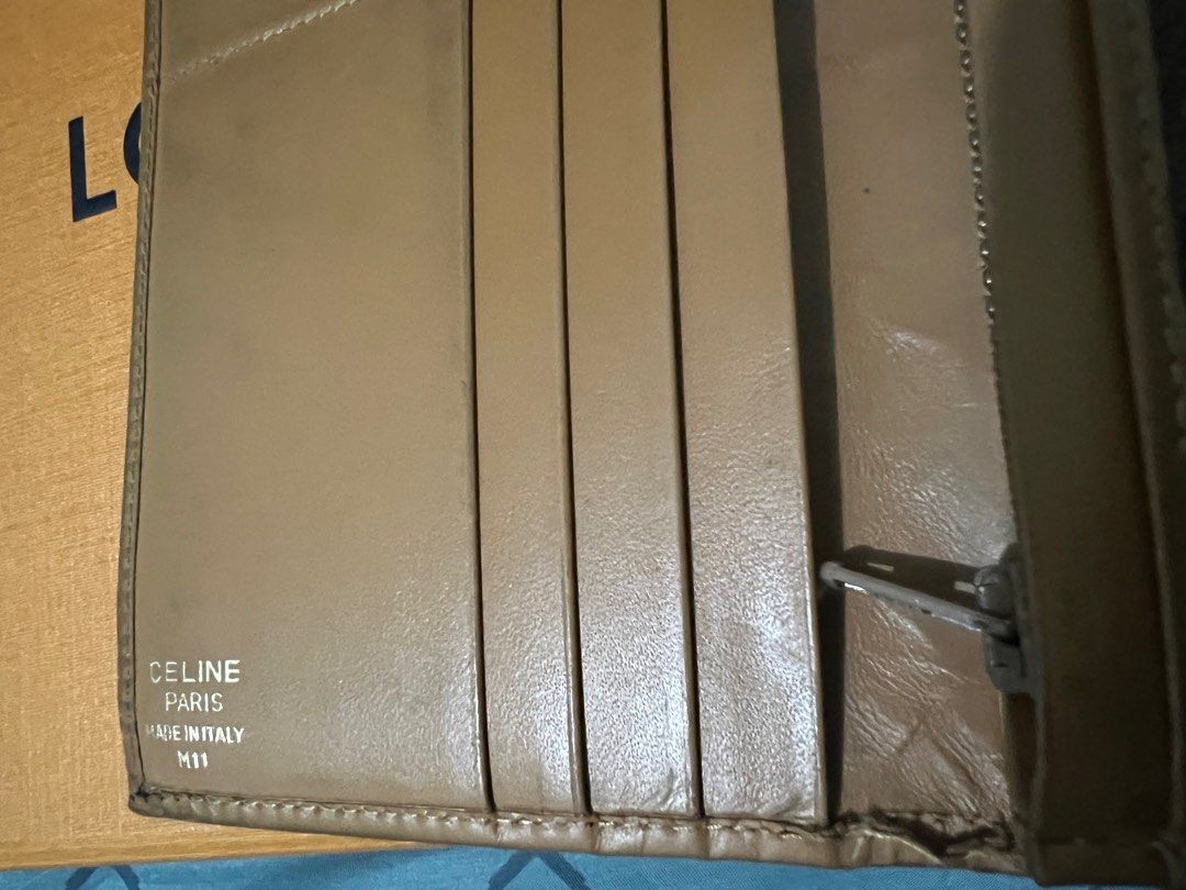 Celine Bundle wallet (Category: Luxury Bags & Wallets) located in Makati City. Submitted by damoreluxe (Listing ID 1299718656, Image 2). Description: Authentic Celine long wallet and Bi-fold wallet Project condition, thats why we’re selling low. issues can be seen on the photos posted. Can still be repaired and usable. Super mura na po kaya bawal sa maselan. FIXED PRICE.