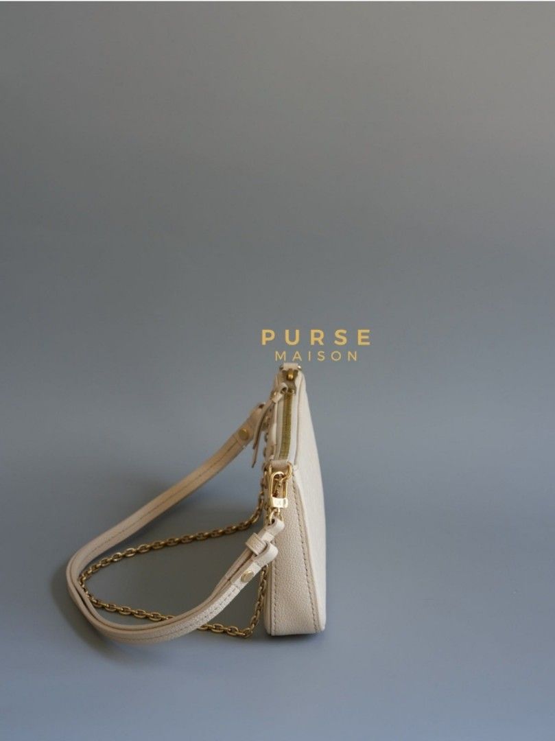 Louis Vuitton Easy Pochette in Monogram Empreinte Crème (Microchip) (Category: Luxury Bags & Wallets) located in Taguig. Submitted by pursemaison (Listing ID 1299717601, Image 3). Description: Louis Vuitton Easy Pochette in Monogram Empreinte Crème (Microchip) ✨Php 75,000 *Additional 3.85% for straight credit card payments *Available for 4 months layaway with 1% interest per month *BDO credit card up to 36 mos & Citibank credit card up to 24 mos 
