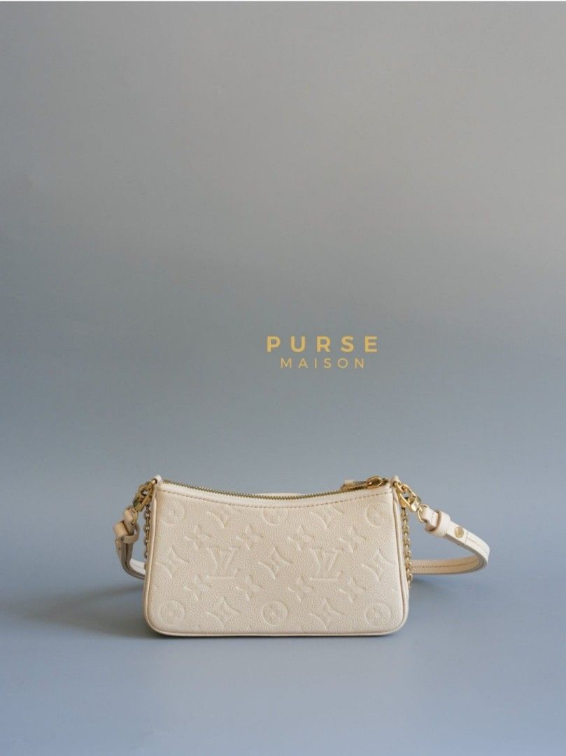Louis Vuitton Easy Pochette in Monogram Empreinte Crème (Microchip) (Category: Luxury Bags & Wallets) located in Taguig. Submitted by pursemaison (Listing ID 1299717601, Image 2). Description: Louis Vuitton Easy Pochette in Monogram Empreinte Crème (Microchip) ✨Php 75,000 *Additional 3.85% for straight credit card payments *Available for 4 months layaway with 1% interest per month *BDO credit card up to 36 mos & Citibank credit card up to 24 mos 