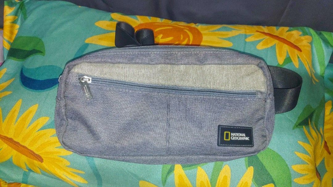 National Geographic Belt Bag (Category: Belt bags, Clutches and Pouches) located in Caloocan City. Submitted by mekthrifter (Listing ID 1299695908, Image 1). Description: - Very good condition - Color rate 9.9/10 - No issue - Shipping charge will be shouldered by the buyer.