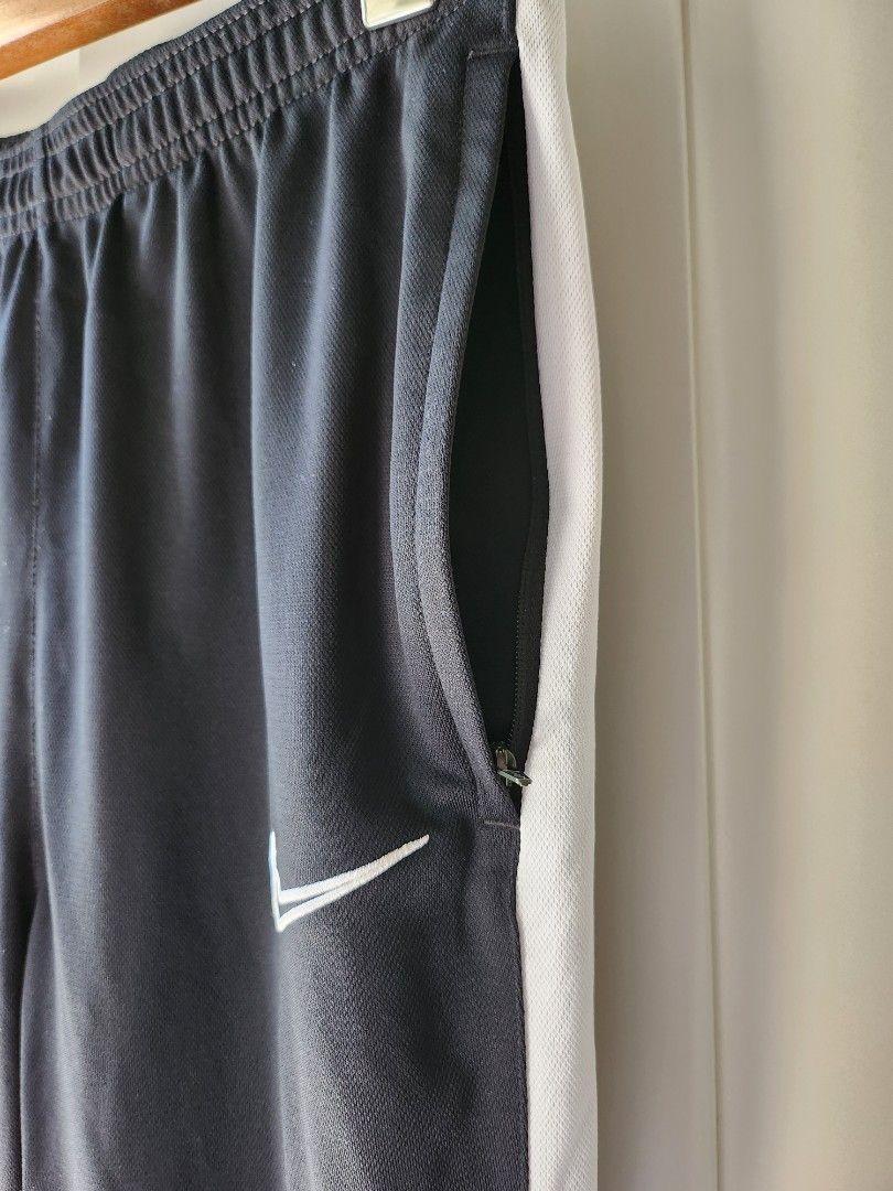 Nike Dri-Fit Track pants (Category: Activewear) located in Quezon City. Submitted by six_half (Listing ID 1299662988, Image 3). Description: Buy as a set with the jacket for 1,850 Barely Used Adjustable waist (27-31") 2 Zippered Side pockets Lenght :37.5".