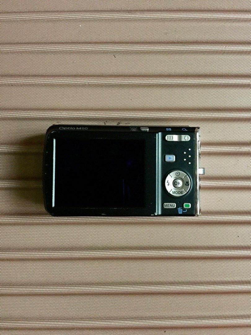 Optio M50 (Category: Cameras) located in Mambajao. Submitted by corals_are_carol (Listing ID 1299639668, Image 2). Description: The LCD is brand new and recently changed! 💯 (Cosmetics 9/10) Flaws: — The CCD sensor needs to be replaced — The lens of the camera won't open (needs to be checked and repaired) Inclusions: 🧷Unit 🧷Battery 🧷Cute beaded strap! 🌺 THE PRICE IS NEGOTIABLE! 💯.