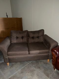 Brown cushion sofa