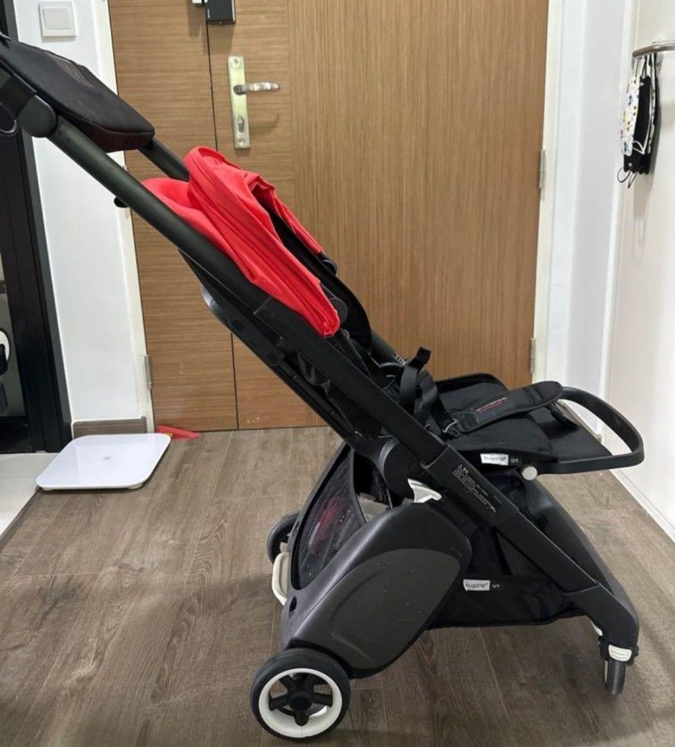 Moving out Star Buy Bugaboo Ant with Red Canopy plus buggy board