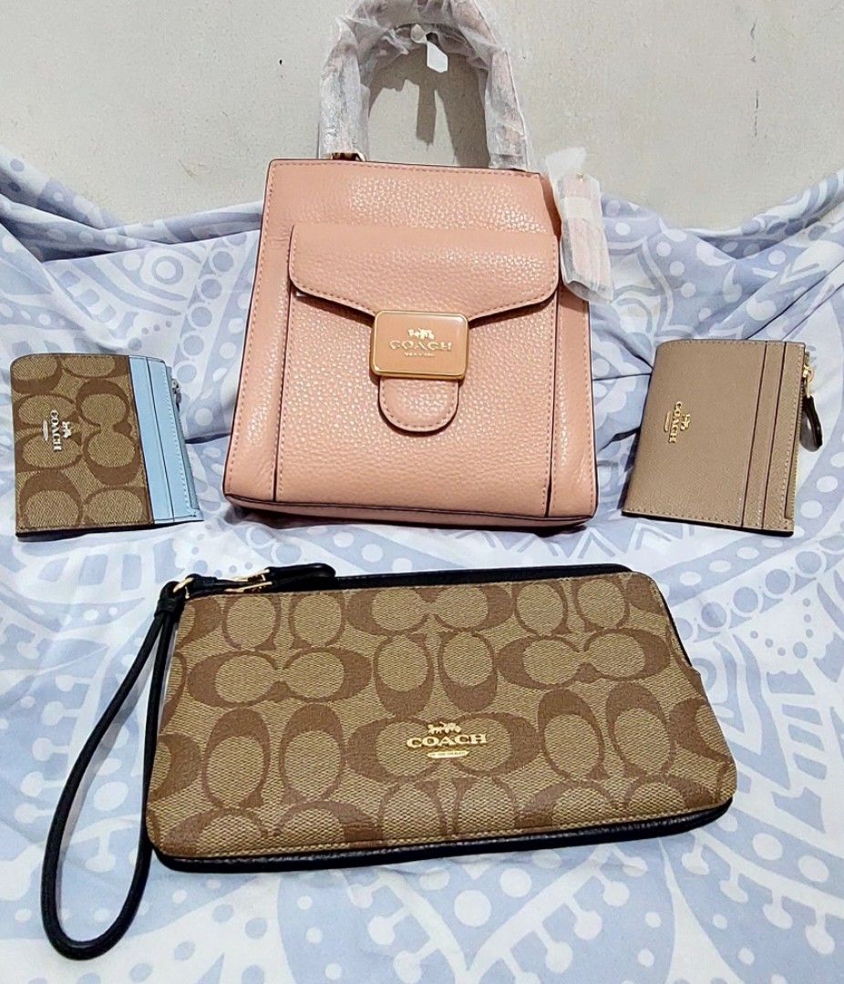 Harga pouch coach on sale