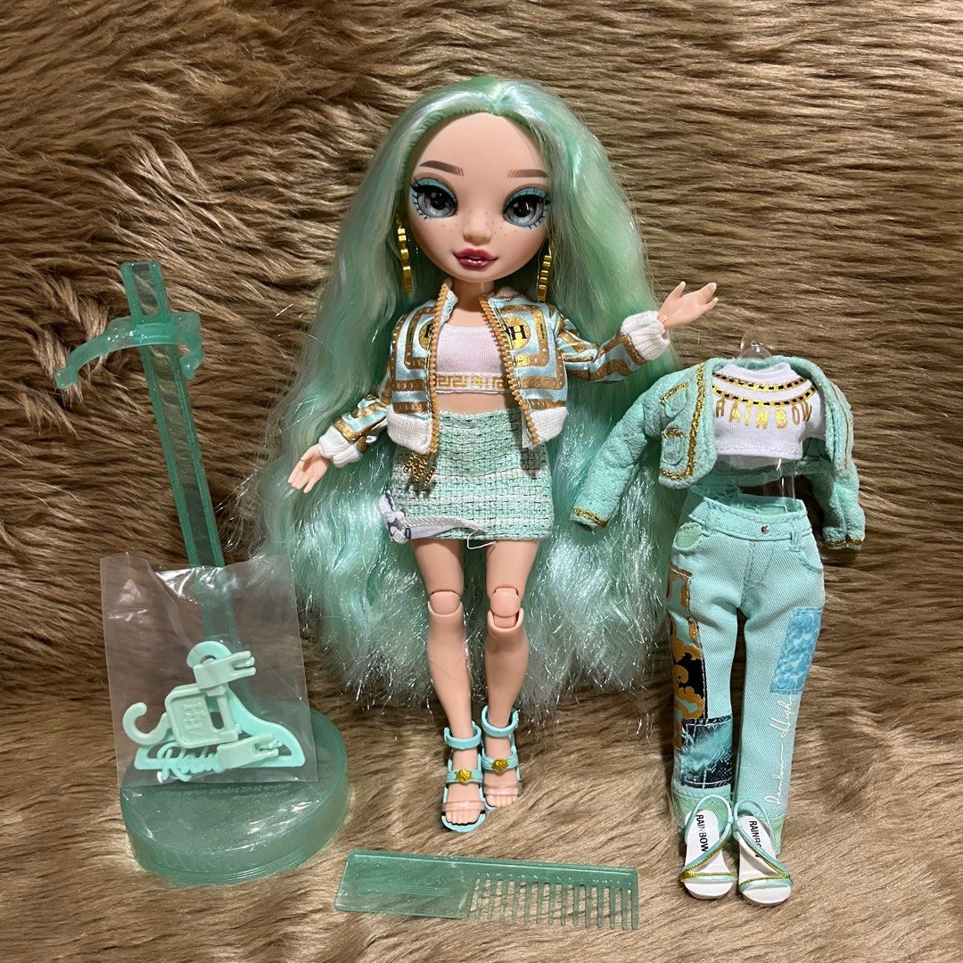 Rainbow High Doll Daphne Minton with Complete Accessories (Category: Kids Toys) located in Cebu City. Submitted by jayrassicpark (Listing ID 1299894297, Image 1). Description: Rainbow High Daphne Minton doll - mint or lime clothes fashion doll with complete accessories for sale for only ₱5000 Details: -1 preloved Rainbow High doll (Daphne - out of the box) -Doll is still in excellent condition (hair is really soft, articulation is superb) -Comes 