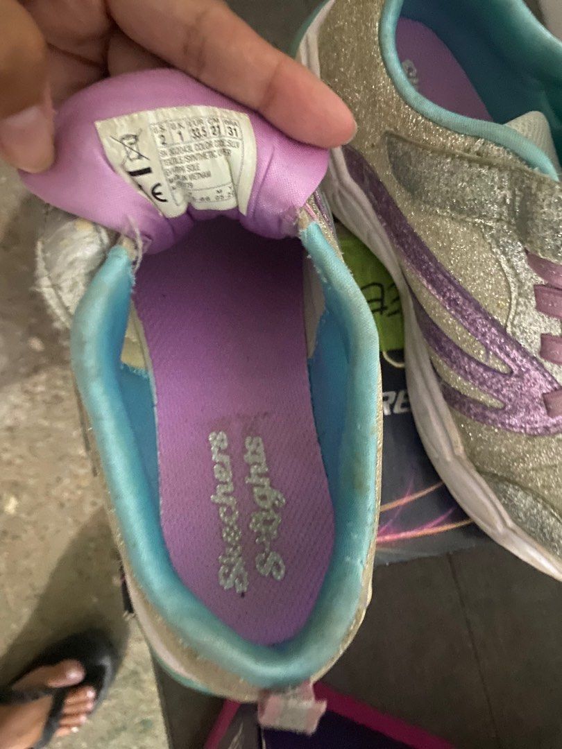 Skechers lights shoes (Category: Babies & Kids Fashion) located in Manila. Submitted by shiim (Listing ID 1299872230, Image 2). Description: Bought from Australia Hindi na kasya sa daughter ko,2 pairs siya well used siya Pero in personal as in maayos pa siya worth it siya sa 1k.