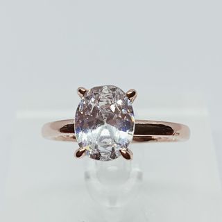 Clear Moissanite ring. Oval cut. 18K rose gold plated.  Available in size 6 & 7.