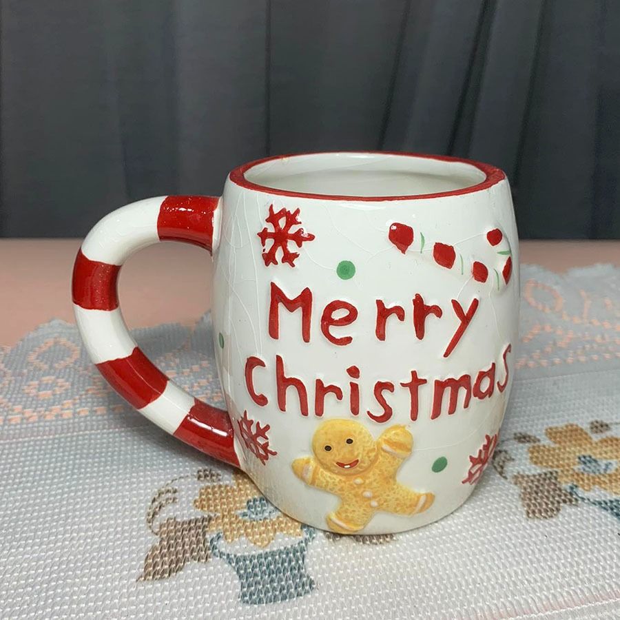 Ginger bread Christmas Mug (Category: Coffee & Tea Tableware) located in Mandaluyong City. Submitted by yula_noveltyfinds (Listing ID 1300028200, Image 1). Description: - UK surplus - ceramic mug - as is where is - with crazings and paint/glaze chips - can be repurposed as decorative piece at dinner table during the holidays - artificial plant, tray, tea light candle and accessories NOT included for photo purposes only. - size: approx: 4" (w) x 5