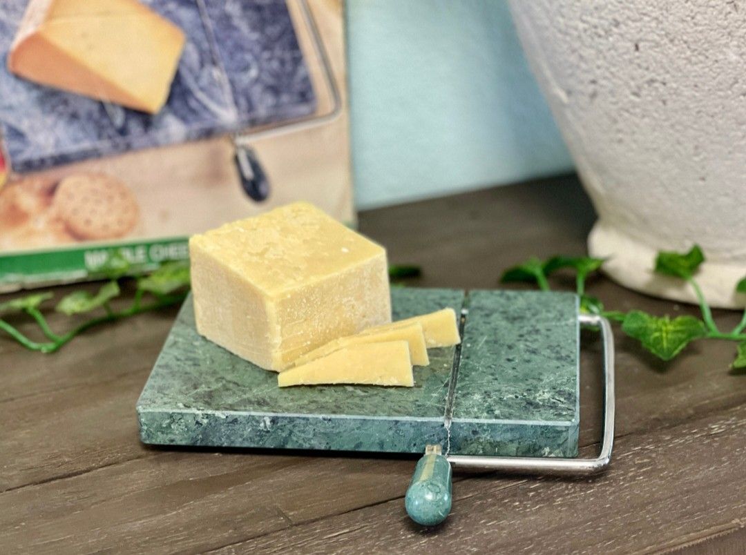 Green marble cheese slicer (Category: Other Kitchenware & Tableware) located in Silang. Submitted by mel_jb88 (Listing ID 1300102104, Image 2). Description: green marble cheese slicer stone cutting board 20 x 13 cm used good condition pm.