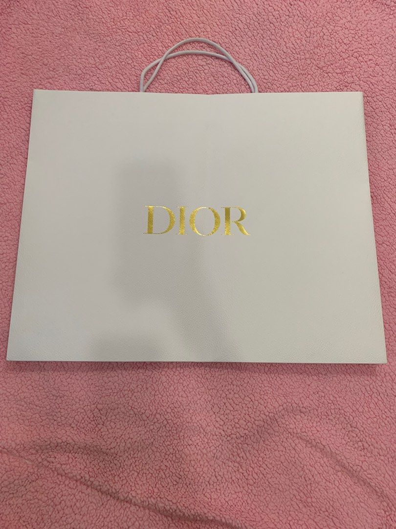 ORIGINAL DIOR BIG PAPER BAG (Category: Luxury Bags & Wallets) located in Pasay City. Submitted by slashed (Listing ID 1299985954, Image 2). Description: ORIGINAL DIOR BUG PAPER BAG BRAND: DIOR DIMENSIONS LENGTH : 64 CM HEIGHT : 51 CM WIDTH : 19 CM.