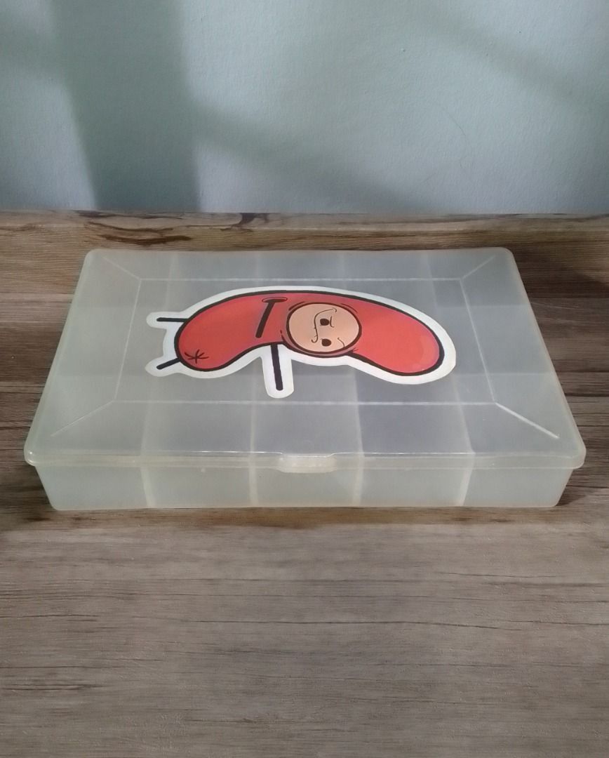 PLASTIC STORAGE BOX WITH DIVIDERS (Category: Storage Boxes & Baskets) located in Mandaluyong City. Submitted by neko.neko21 (Listing ID 1300019682, Image 2). Description: SIZE : 9 X 6 INCHES FORMAT : Storage Box REMARK : - Multiple storage slots (12 Slots) - No cracks or damages. - Still intact. - With "Sausage Guy" decal. PAYMENT METHOD - BDO - BANK OF COMMERCE - G CASH - CASH (on pick up) *SHIPPING or PICK UP - PICK UP - Talia Bldg. Boni Ave. M
