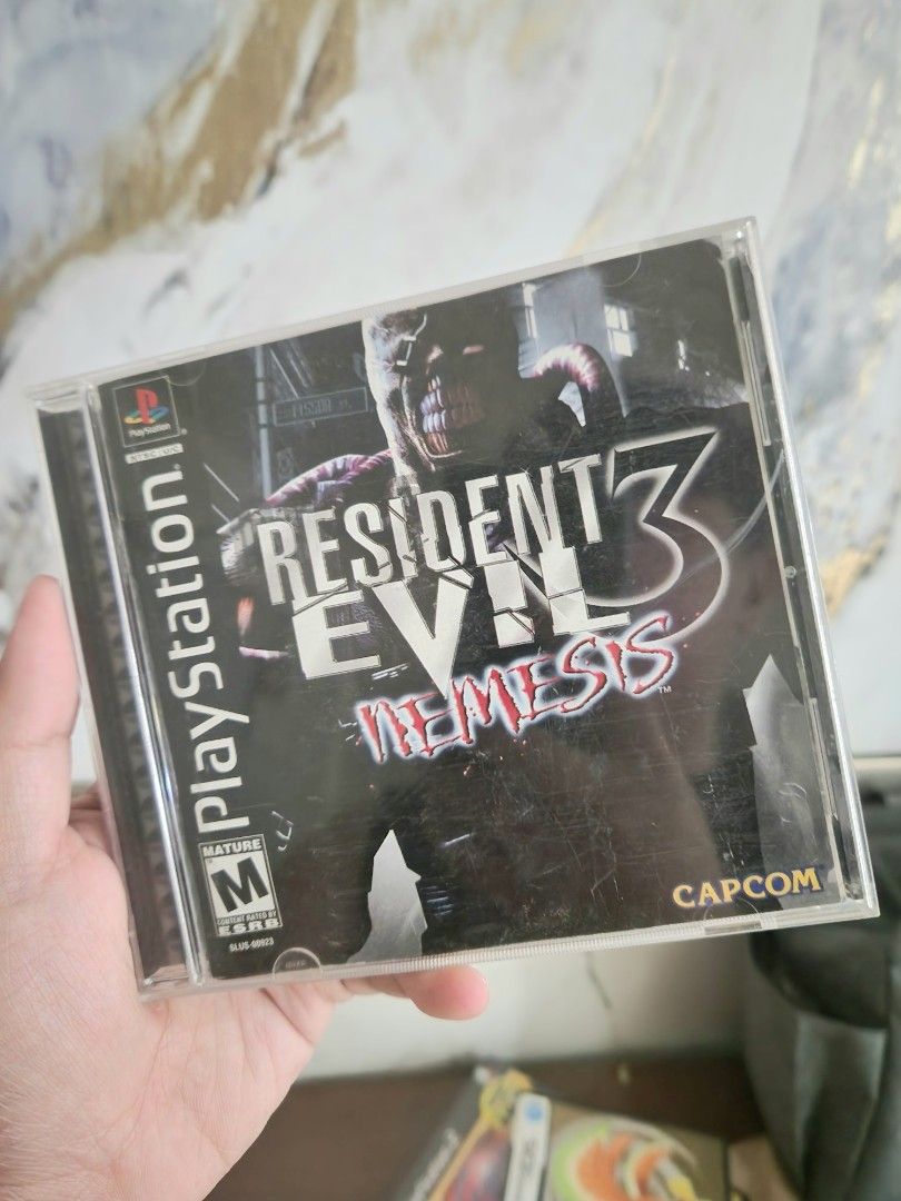 Resident Evil 3 Nemesis (Complete) Authentic for PS1 Ps One (Category: PlayStation) located in Mandaluyong City. Submitted by chan.ningtatum (Listing ID 1299958069, Image 1). Description: For sale! Resident Evil 3 Nemesis Good Working Condition. Complete In Box. Authentic / Original Black Disc Checkouts via Shope e and Laz ada Available Shipping: Lalamove, Grab, Toktok. Meet ups: Mandaluyong and San Juan City.