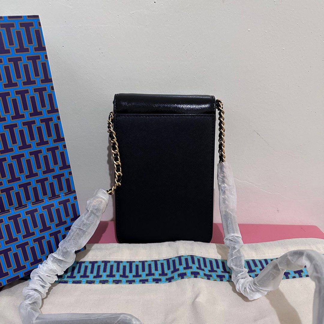 Tory Burch Phone Pouch (Category: Luxury Bags & Wallets) located in Makati City. Submitted by lux.mariah (Listing ID 1299996060, Image 3). Description: 💯 Guaranteed authentic Brand new Complete Inclusions Paperbag - Dustbag Phone Pouch Courier: J&t - Lalamove - LBC Mop: Gcash - Bdo - Maya Guaranteed 💯 All bags posted are Original..