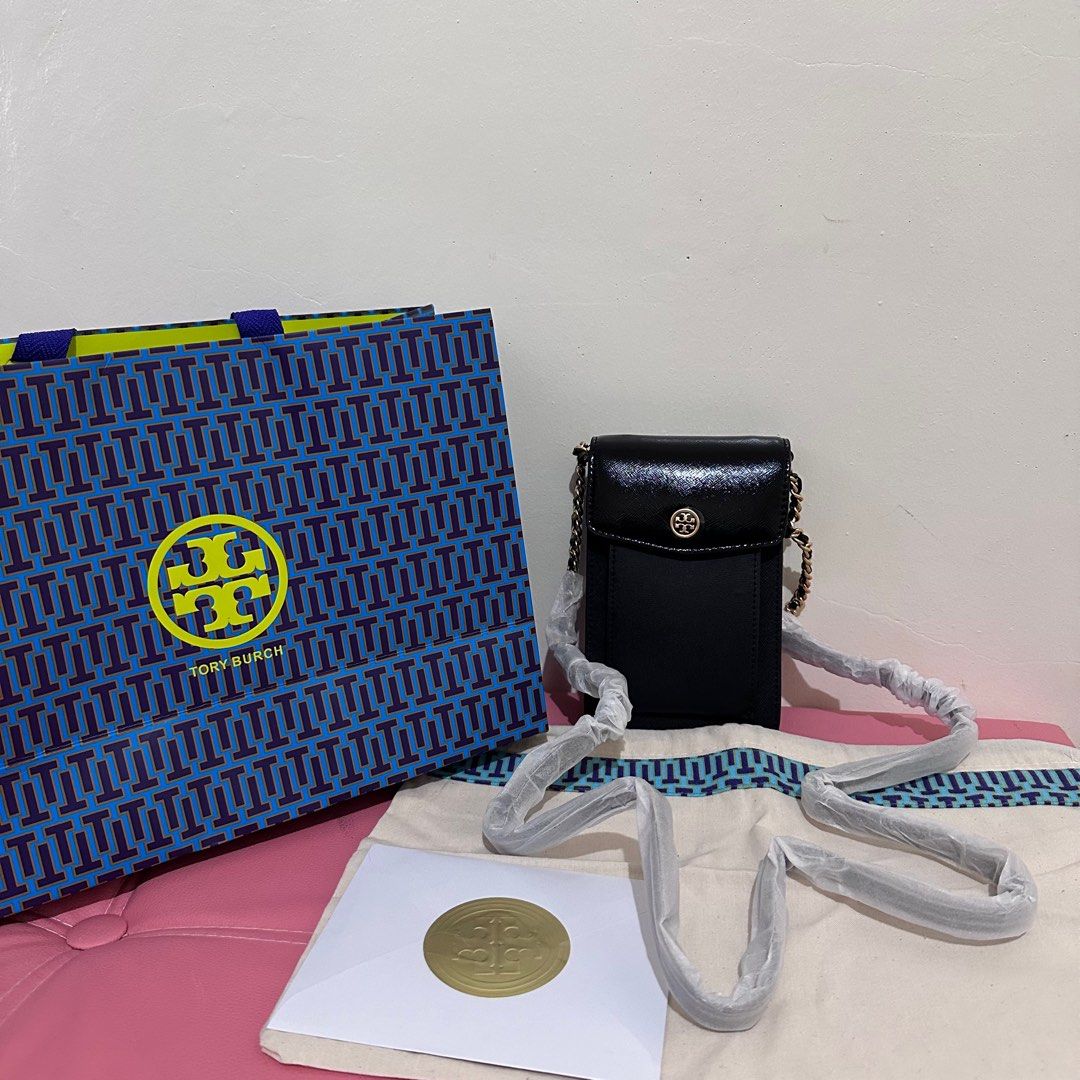 Tory Burch Phone Pouch (Category: Luxury Bags & Wallets) located in Makati City. Submitted by lux.mariah (Listing ID 1299996060, Image 1). Description: 💯 Guaranteed authentic Brand new Complete Inclusions Paperbag - Dustbag Phone Pouch Courier: J&t - Lalamove - LBC Mop: Gcash - Bdo - Maya Guaranteed 💯 All bags posted are Original..