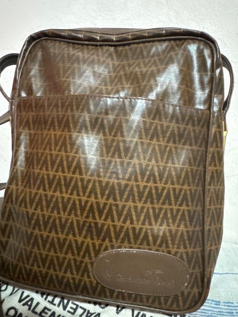 Valentino sling bag (Category: Luxury Bags & Wallets) located in San Pablo. Submitted by ShopbyLiz (Listing ID 1299947090, Image 2). Description: Authentic Spacious Flaw: signs of use.