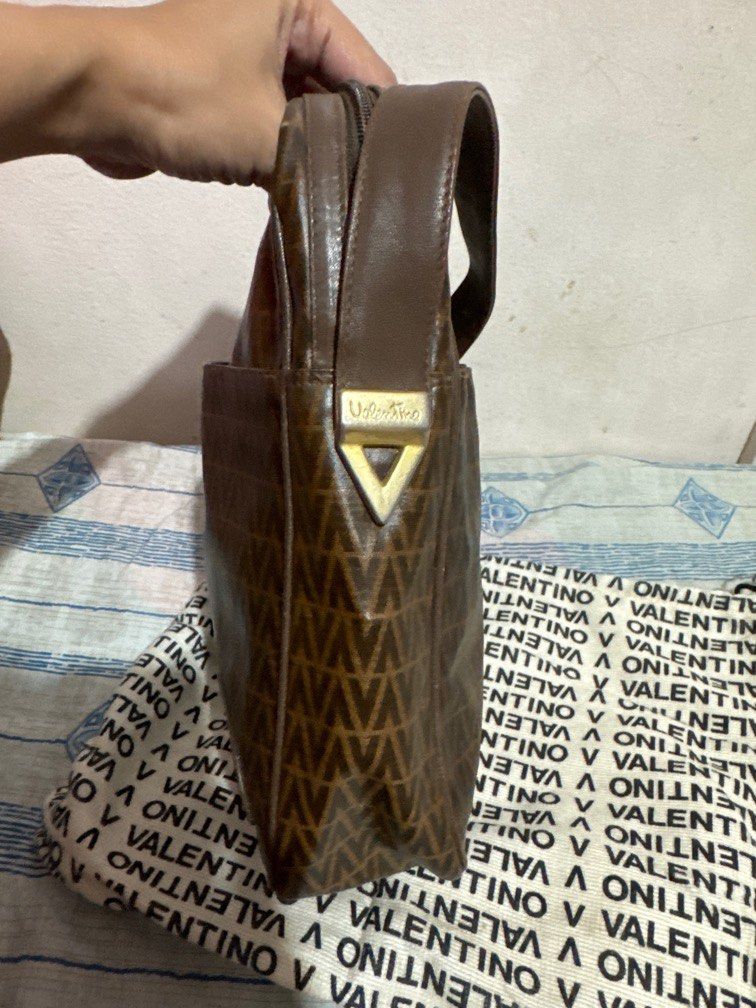 Valentino sling bag (Category: Luxury Bags & Wallets) located in San Pablo. Submitted by ShopbyLiz (Listing ID 1299947090, Image 3). Description: Authentic Spacious Flaw: signs of use.