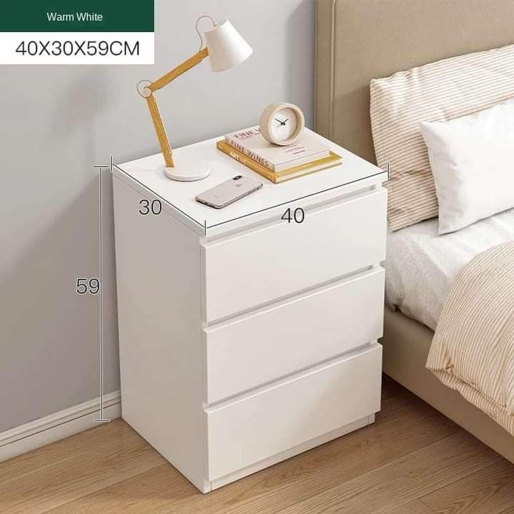 Bedside drawer table (Category: Shelves, Cabinets & Racks) located in Pasig City. Submitted by graceellaolshope (Listing ID 1300244203, Image 2). Description: bedside drawer table maple white white 1,200.