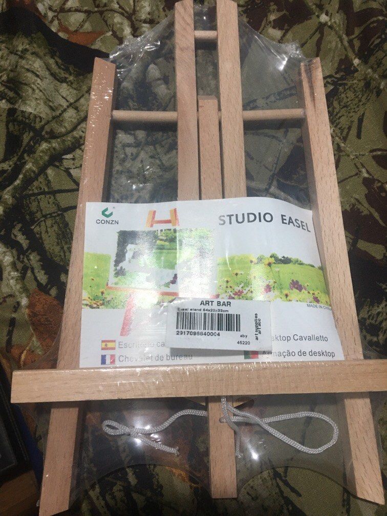 Easel stand 64x22x33cm (Category: Craft Supplies & Tools) located in Quezon City. Submitted by aldenpv (Listing ID 1300245714, Image 1). Description: Easel stand 64x22x33cm Mall price 400 Sealed For picture/art stand Unused and for decluttering.