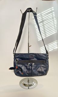 Kipling New Angie in True Blue coated fabric