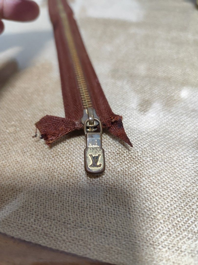 Lv (Category: Luxury Bags & Wallets) located in Manila. Submitted by mistej (Listing ID 1300250059, Image 3). Description: lv ziper puller authentic for baguett small bag lv no damage.