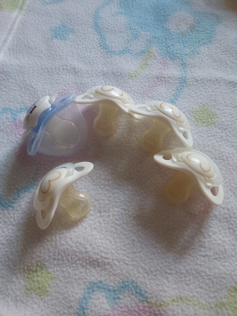 NUK pacifiers take all 5pcs (Category: Soothers & Pacifiers) located in Quezon City. Submitted by littlefonsy (Listing ID 1300108427, Image 2). Description: NUK pacifiers take all 5pcs.