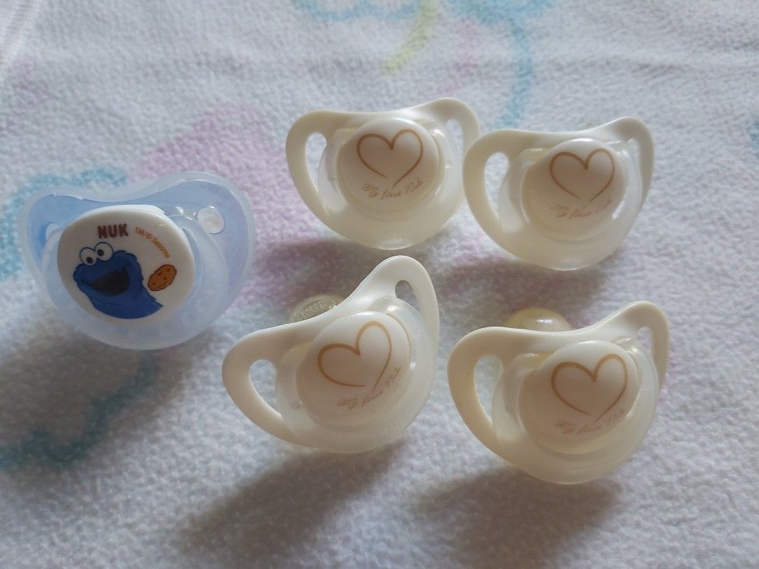 NUK pacifiers take all 5pcs (Category: Soothers & Pacifiers) located in Quezon City. Submitted by littlefonsy (Listing ID 1300108427, Image 1). Description: NUK pacifiers take all 5pcs.