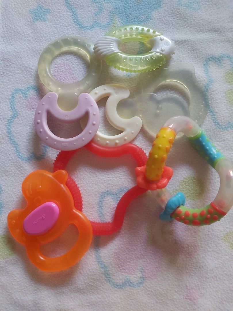 Teethers (Pigeon,NUK, dr.browns) take all 6pcs (Category: Soothers & Pacifiers) located in Quezon City. Submitted by littlefonsy (Listing ID 1300108383, Image 1). Description: Teethers all branded take all NUK, Dr. Browns, Pigeon..