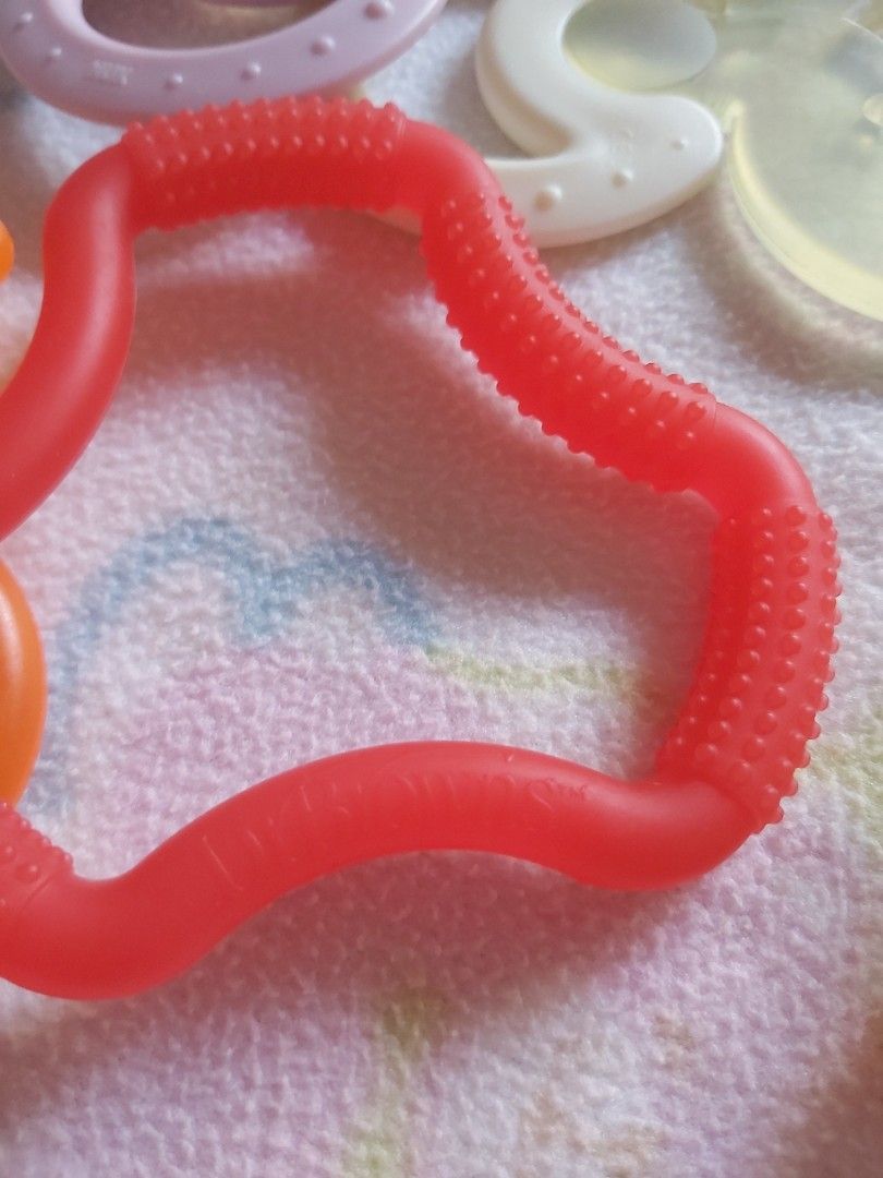 Teethers (Pigeon,NUK, dr.browns) take all 6pcs (Category: Soothers & Pacifiers) located in Quezon City. Submitted by littlefonsy (Listing ID 1300108383, Image 3). Description: Teethers all branded take all NUK, Dr. Browns, Pigeon..