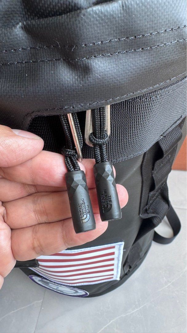 TNF Supreme Duffle Fuse Box II (Category: Backpacks) located in Manila. Submitted by ryan.d1 (Listing ID 1300161470, Image 3). Description: Legit/Original/Authentic💯 Fully Waterproof duffle bag/backpack double wall lining for weather resistance with ID info slot at the back 30L capacity Full wash tags/hang tags waistline sternum strap support w/ whistle padded/breathable shoulder straps for better cushions came from Manitoba Canada 🇨🇦 Canada c