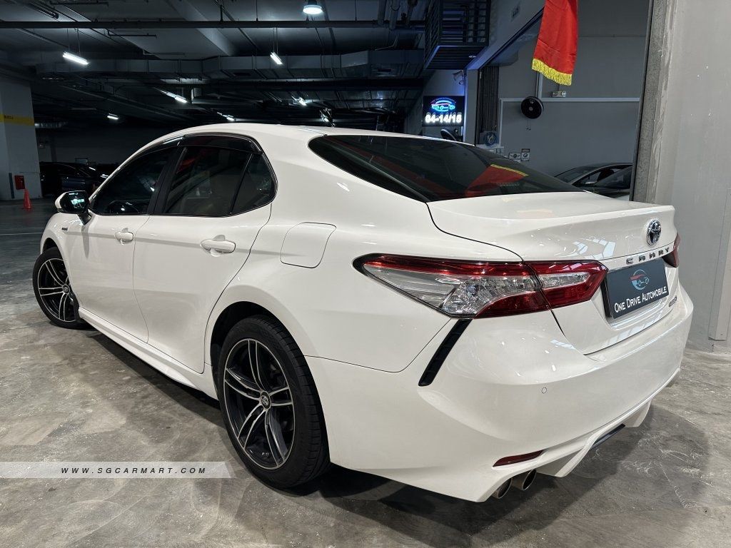 Toyota Camry Hybrid 2.5 Ascent Sport (A) (Category: Used Cars) located in Singapore. Submitted by drivegallery (Listing ID 1300127321, Image 2). Description: 1 OWNER UNIT MONTHLY FROM $1200 Clearance Sale🔥🔥🔥 Looking for a fuss-free car purchase experience? - LOWEST Interest Rate From 2.48% - Flexible Finance Schemes - Full Loan Availability - $0 Driveaway Availability - HIGHEST Trade In Quote ☎️Contact Number Javan- 9323 2295.