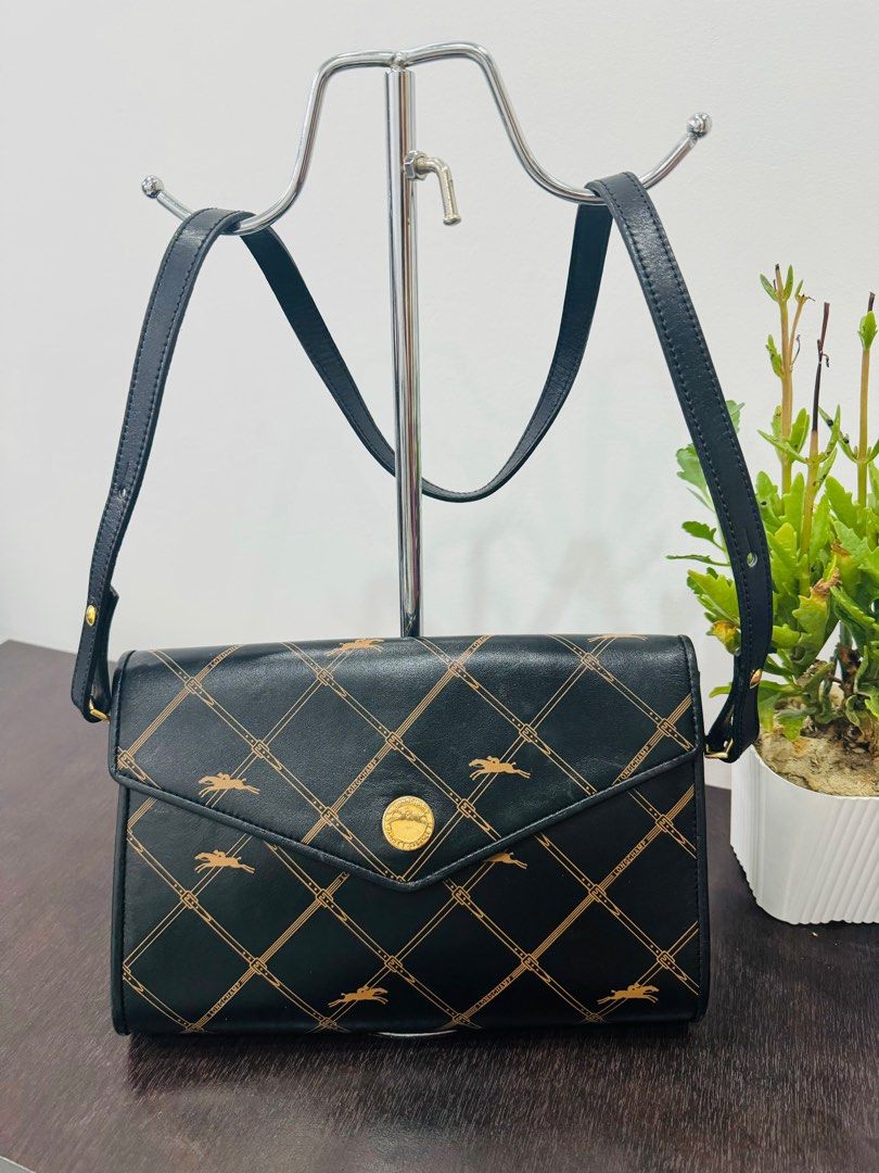 Vintage Longchamp shoulder bag/sling (Category: Luxury Bags & Wallets) located in San Pedro. Submitted by ely.c. (Listing ID 1300202706, Image 1). Description: Authentic vintage longchamp long strap shoulder sling bag 🥀 Rank A condition 🥀 Small size fits long wallet 🥀 Buyer will shoulder shipping fee.