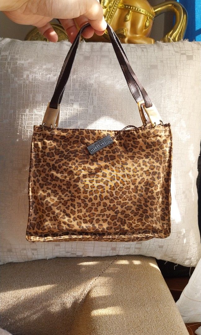 Bottega Veneta Mini Handbag (Category: Luxury Bags & Wallets) located in Cavite. Submitted by mom0f2 (Listing ID 1300262339, Image 1). Description: pre-owned bag width 20cm bag depth 6cm lining material : fabric Huella animal print.