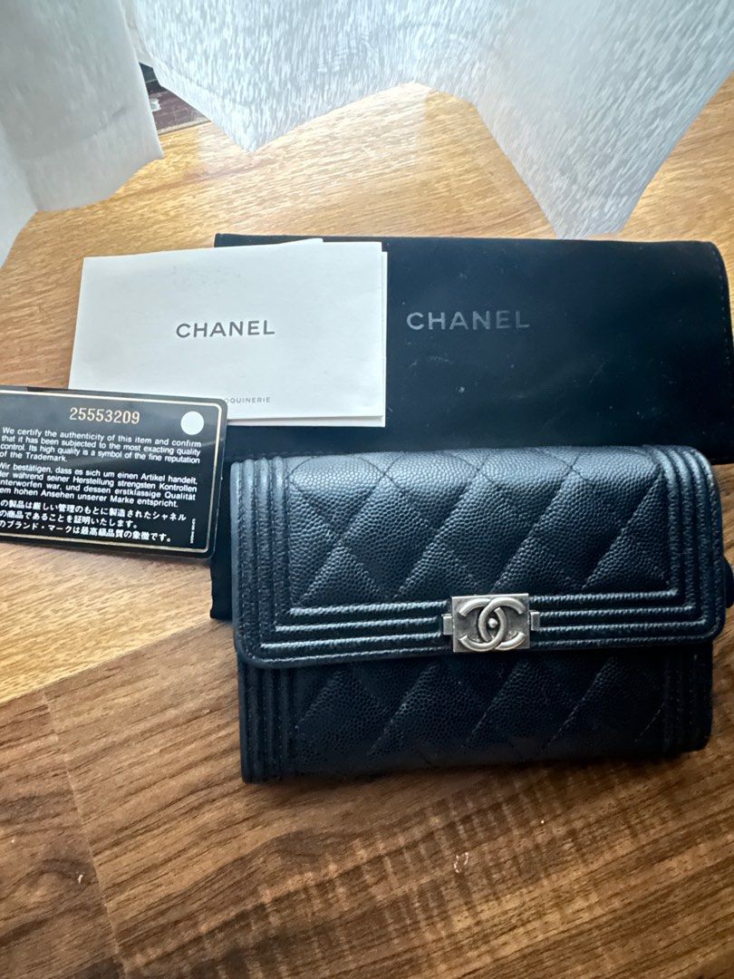 Chanel Le Boy Caviar Wallet (Category: Luxury Bags & Wallets) located in Davao. Submitted by sayvc (Listing ID 1300310666, Image 2). Description: Well loved wallet from Paris With dustbag Black Caviar Condition: 8.5/10 Signs of usage Price slightly negotiable RFs: decluttering W/ card receipts and dustbag.