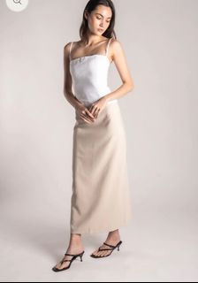 For keeps the label Midi Skirt in Ecru